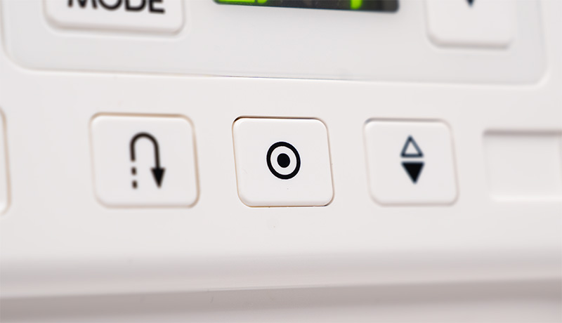 Janome DC1030 Auto Lock-Off Stitch Button